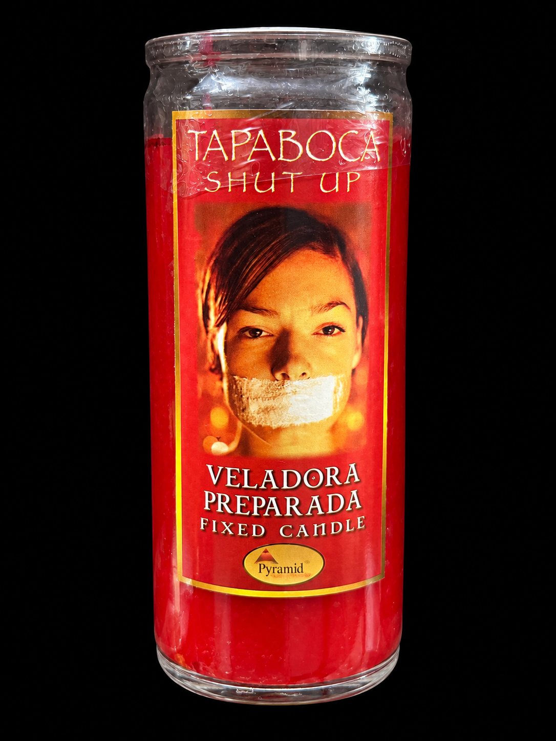 Veladora Tapaboca centrada sobre fondo negro